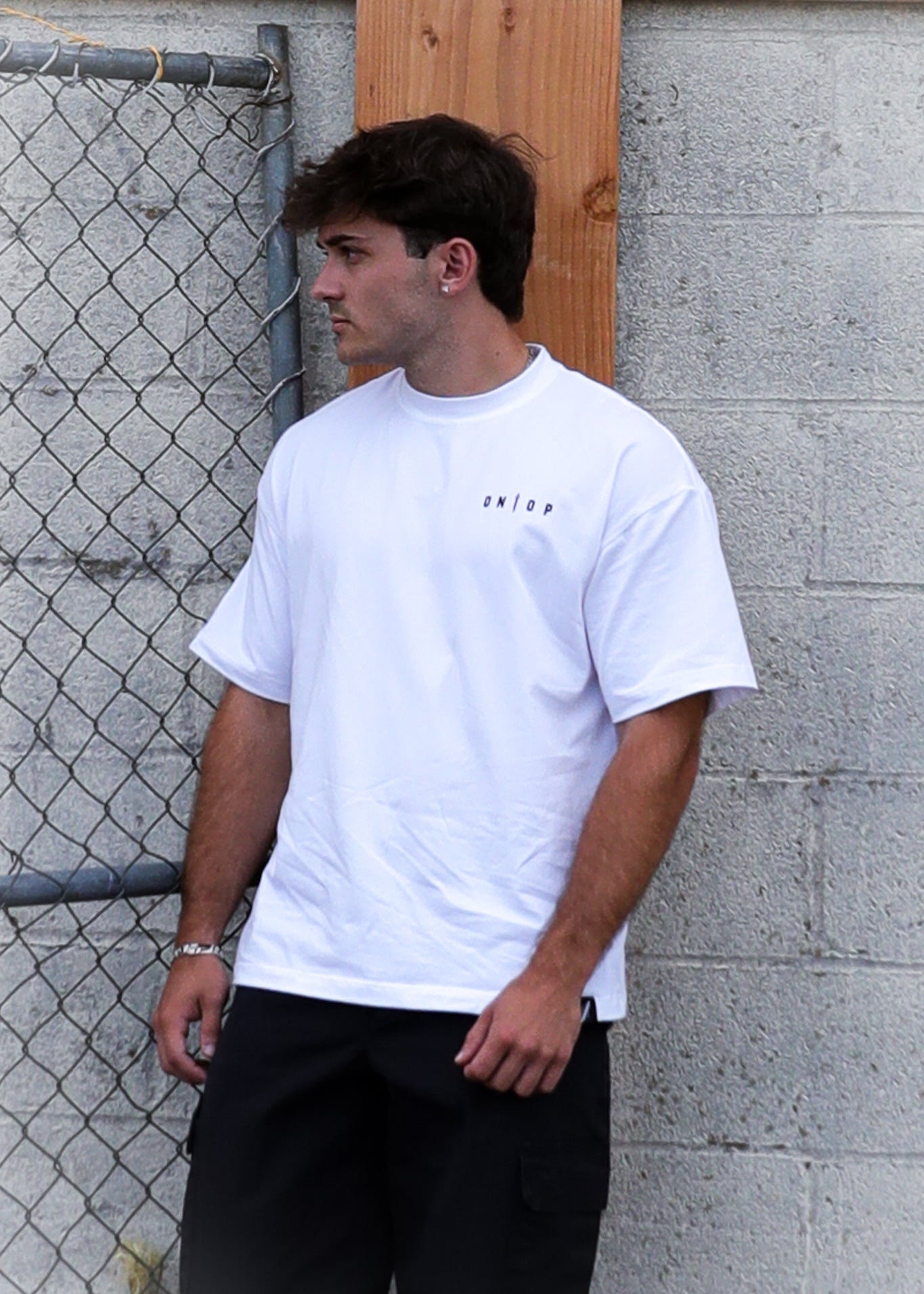 102 - Oversized Dagger Logo Tee
