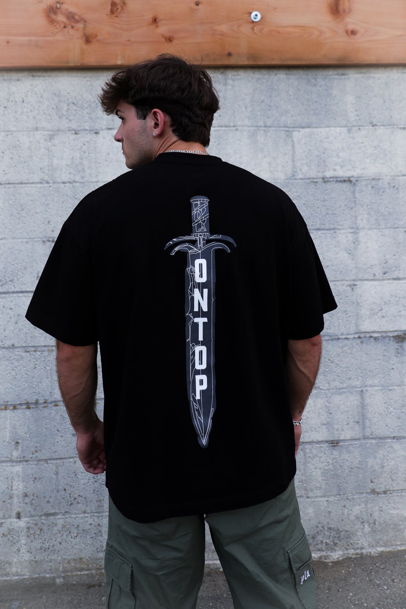 102 - Oversized Dagger Logo Tee